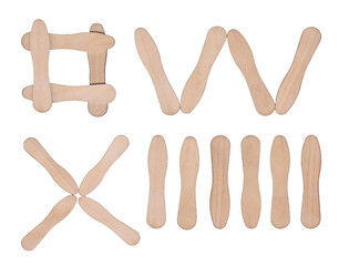 Crafting shapes with sticks in a creative display on a white background