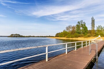 wooden bridge over lake