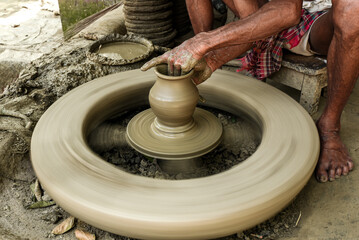 Handcrafted Pottery Creation on Traditional Spinning Wheel Close-Up