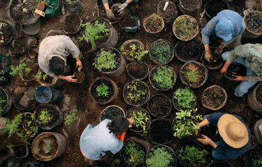 Community garden with people planting for eco-friendly and sustainable farming