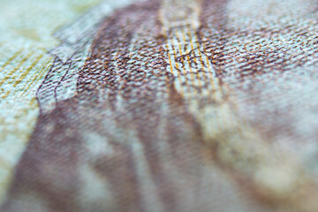 Close-Up View of Detailed Textured Surface of Paper Currency Design