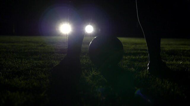 Experience the Intense Nighttime Soccer Action with Stunning and Dramatic Lighting Effects