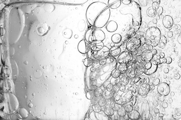 Oil with bubbles abstract background. Soft selective focus.