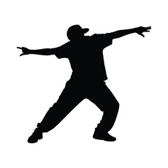 Silhouette of a dancer in motion with arms extended