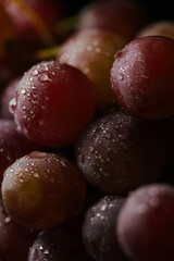 Fresh red grapes close up, organic fruit, juicy healthy food