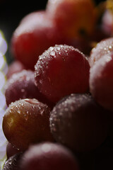 Fresh red grapes close up, organic fruit, juicy healthy food