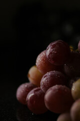 Fresh red grapes close up, organic fruit, juicy healthy food