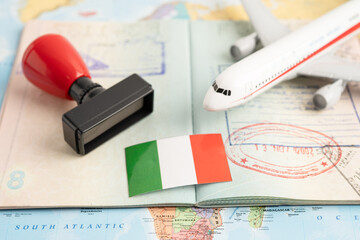 Approved Stamp visa and passport with Italy flag document to immigration at airport in country.