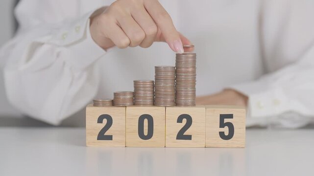 2025 end year to Happy New Year 2026 with Coins stack. Money, Budget, tax, investment, financial, savings and New Year Resolution concepts