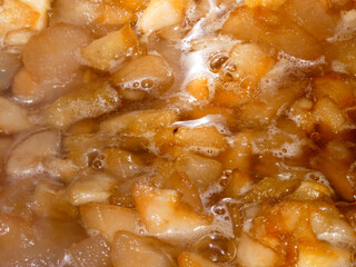 Homemade Apple Jam Boiling in a Pot