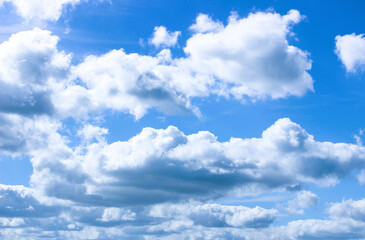 Beautiful clouds in the bright blue sky in the morning 
