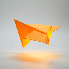 Orange Paper Airplane: Origami Art, Flight, and Creativity