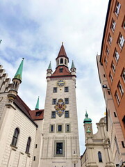 The bell tower with the clock tower of the old Town Hall on Marienplatz in Munich.
