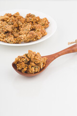 heap of granola isolated on white background