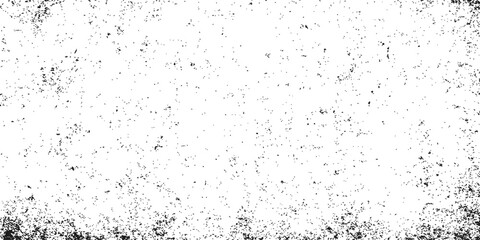 Abstract grunge texture of black ink splat drops on a dirty glass surface with a film