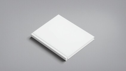 Brochure with blank cover on grey background, top view. Mock up for design
