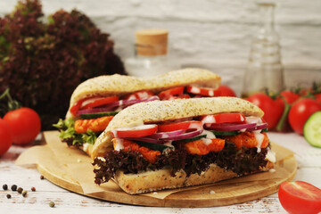 Baguette sandwiches with chicken and fresh vegetables	