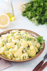 A bowl with Greek potato salads	