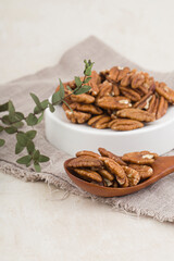Many pecan nuts isolated on white, set