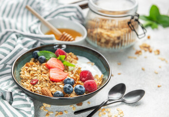 Granola bowl with yogurt and fresh berries