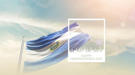 El Salvador flag waving proudly under a bright sky with text happy independence day. El Salvador...