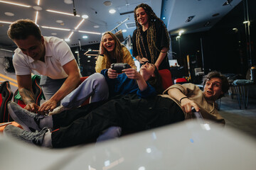 Friends gathered playing games, enjoying laughs, and sharing a joyful moment in a contemporary gaming space, reflecting teamwork, excitement, and camaraderie.