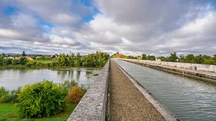 Scenic landscape view of famous Pont-Canal navigable aqueduct over Garonne river, Agen, Lot-et-Garonne, France