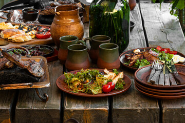 traditional cuisine delicious meal and salad medieval authentic restaurant dish on table colorful garden outdoor