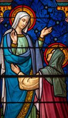 Stained glass (19th century) of Visitation of the Virgin Mary to her pregnant cousin Elizabeth.