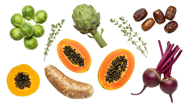 Fresh tropical and root vegetables including papaya, artichoke, brussels sprouts, beets, dates, and yuca for healthy cooking and meal preparation