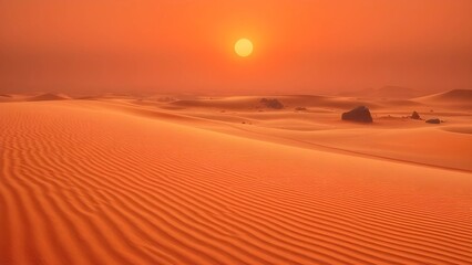 Naklejka premium Orange sunset sky over sandy Saharan desert dunes in Morocco, a dry wilderness landscape