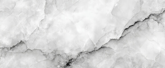 Fototapeta premium A close-up view of a textured white marble surface featuring subtle gray veining, perfect for backgrounds in design projects or architectural presentations