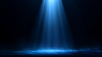 Blue Spotlight on Dark Stage Background