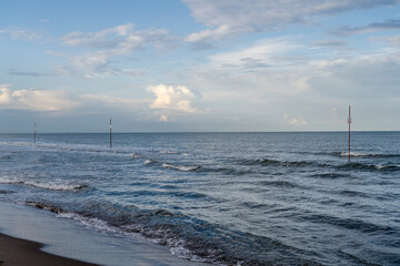 little waves on Adriatic sandy beach, Rosolina Mare, Italy