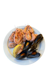 Gourmet seafood plate with fresh shrimp and mussels delicious Mediterranean cuisine served on white dish healthy culinary background