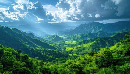 Naklejka premium Lush Green Mountain Valley Landscape Under Dramatic Sky
