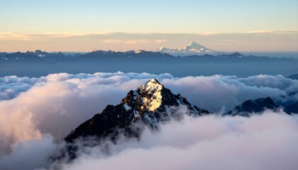 Majestic snow-capped peak emerges from clouds at sunset, distant mountains visible