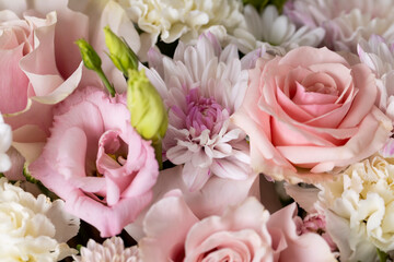 a beautiful bouquet of mixed flowers of different colors, made for decoration and giving, a beautiful composition of different flowers of different colors put together