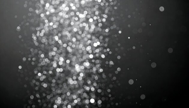 Abstract grayscale bokeh, swirling light particles