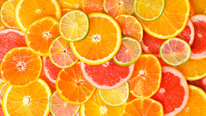 Pattern of ripe citrus fruits. Close up.