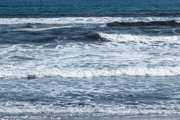 Fototapeta premium blue water waves, Khalaktyrsky Beach of Avacha bay