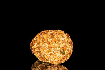 Thaler cookies with nuts and honey isolated on black background, close-up.