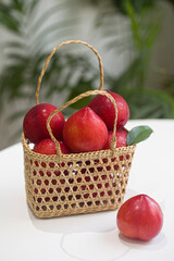 Red plums, isolated on white background