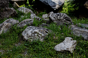 remains of architectural pieces from the decoration of an ancient building in Athens, Greece