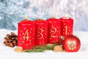 Fourth 4th Sunday in advent Christmas time copyspace copy space with burning candle snow winter