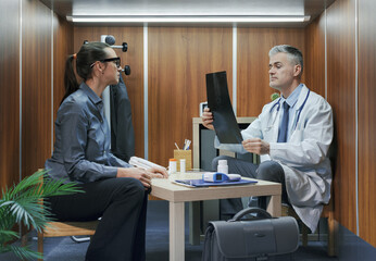 Doctor checking a patient's radiograph