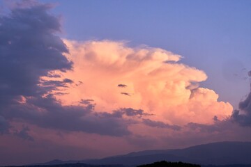 Scenic view of pink and purple clouds at sunset