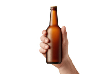 Hand holding a brown glass beer bottle on black background, cut out