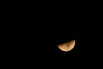 Mesmerizing view of the moon in a black night sky