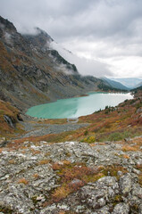 View on lake Kuyguk from Kuyguk mountain range on a grey cloudy morning, the Altai Republic, Russia